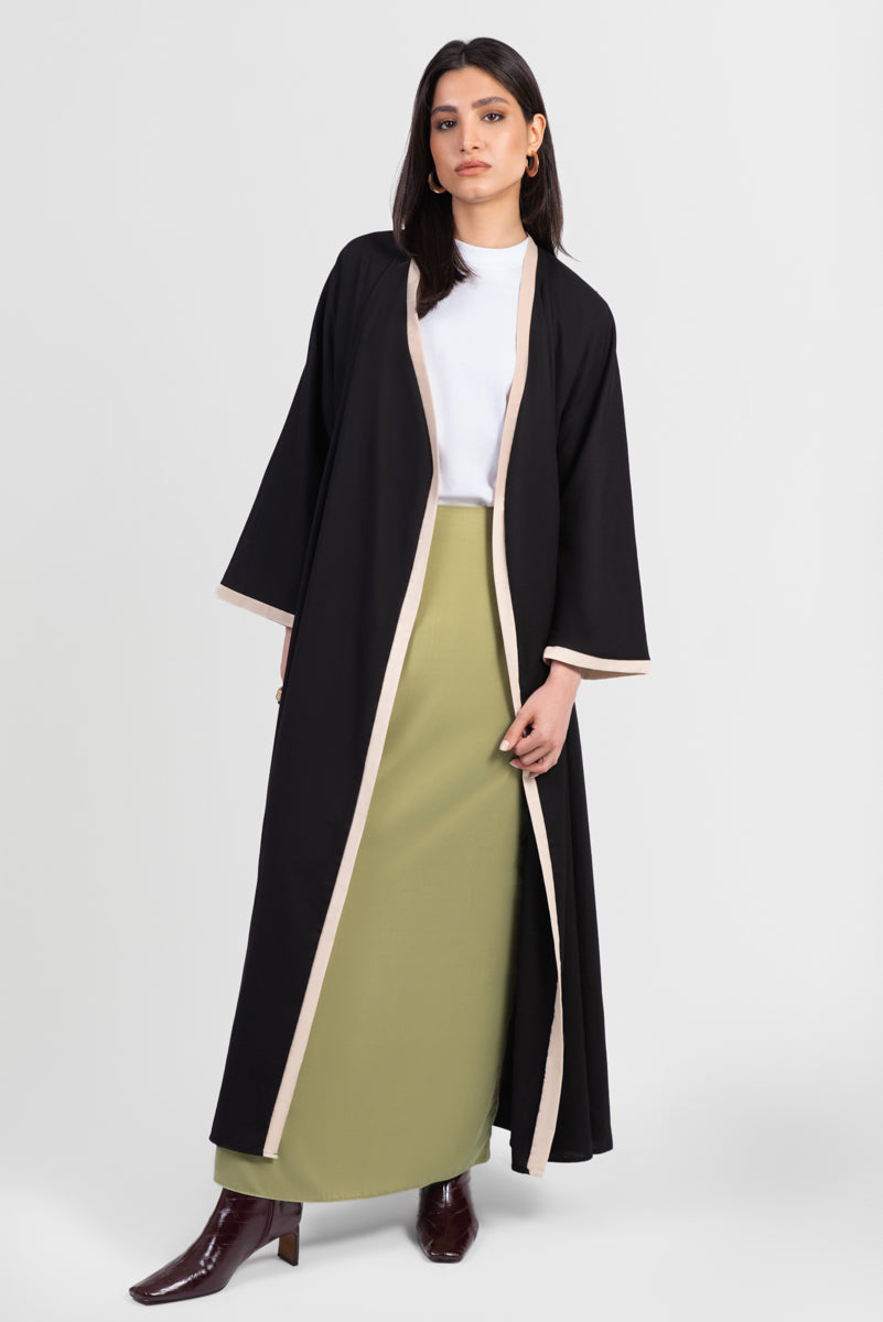 Black linen cotton kimono-style abaya with off-white trim along edges and matching belt front view open front