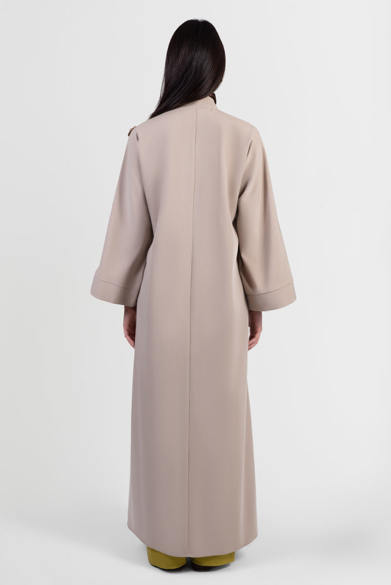 Taupe abaya with 3D flowers around chest back view