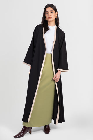 Black linen cotton kimono-style abaya with off-white trim along edges and matching belt front view open front