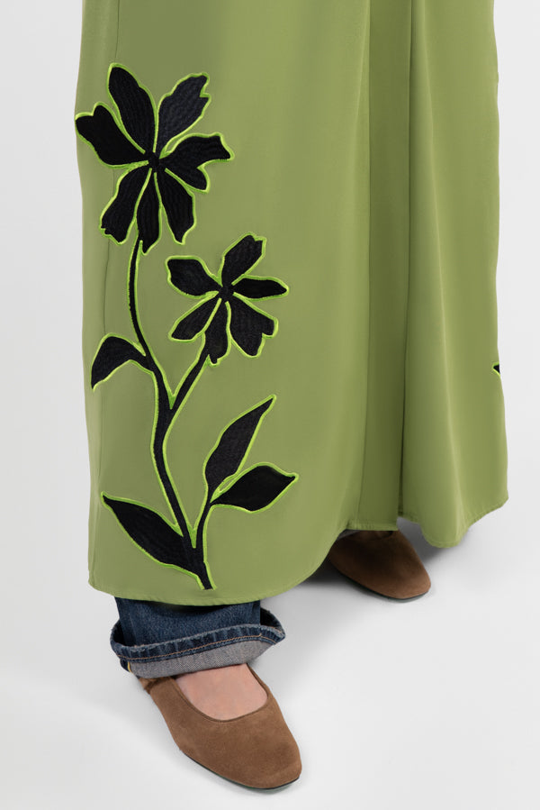 Moss green abaya with black embroidery and bright green outline