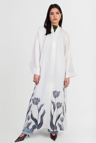 Off-white abaya with navy embroidered floral details front view