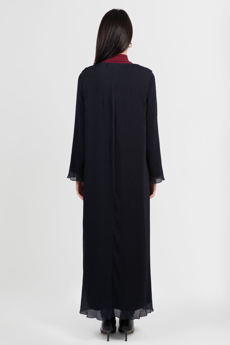 Black abaya with printed pattern and pleated design, with matching belt, back view