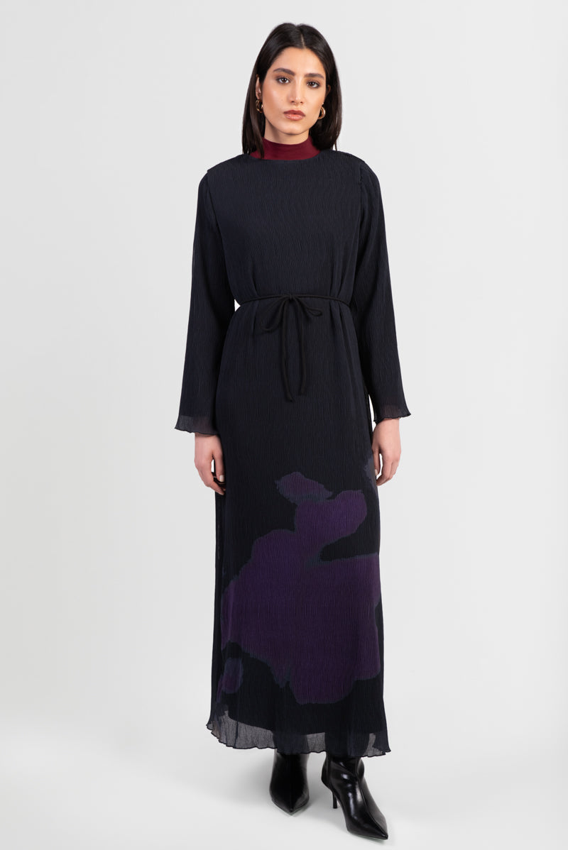 Black abaya with printed pattern and pleated design, with matching belt, front view