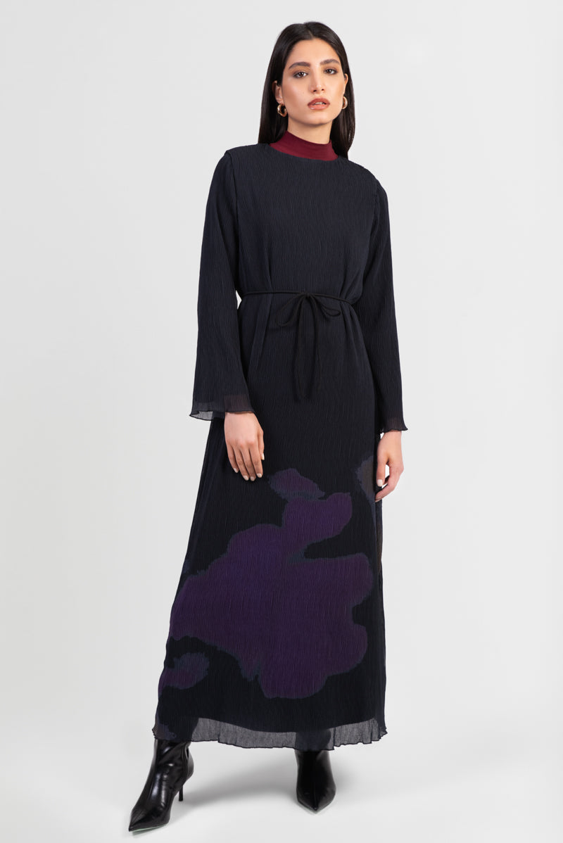Black abaya with printed pattern and pleated design, with matching belt, front view