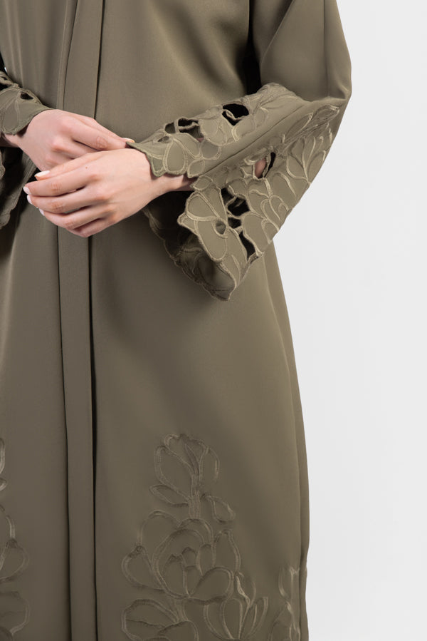 Olive green Tencel abaya with tonal embroidered flowers, cutout flowers details close-up