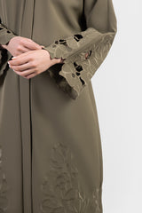 Olive green Tencel abaya with tonal embroidered flowers, cutout flowers details close-up