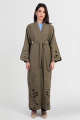 Olive green Tencel abaya with tonal embroidered flowers, cutout flowers and matching belt front view