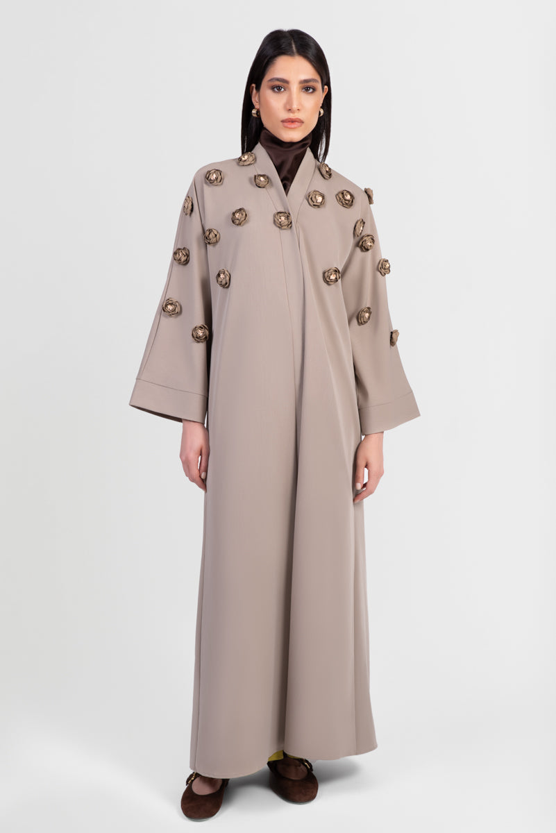 Taupe abaya with 3D flowers around chest front view