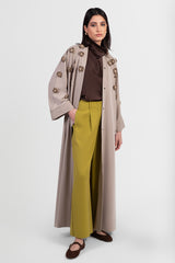 Taupe abaya with 3D flowers around chest, and unbuttoned front